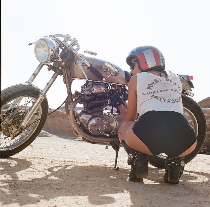A playful frame from Girls on a motorcycle — online in Philadelphia